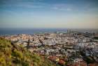 Canary Islands-Tenerife Island-Santa Cruz de Tenerife-elevated view of city and port-late afternoon Art Print